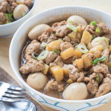 braised ground pork, potatoes and quail eggs in a bowl