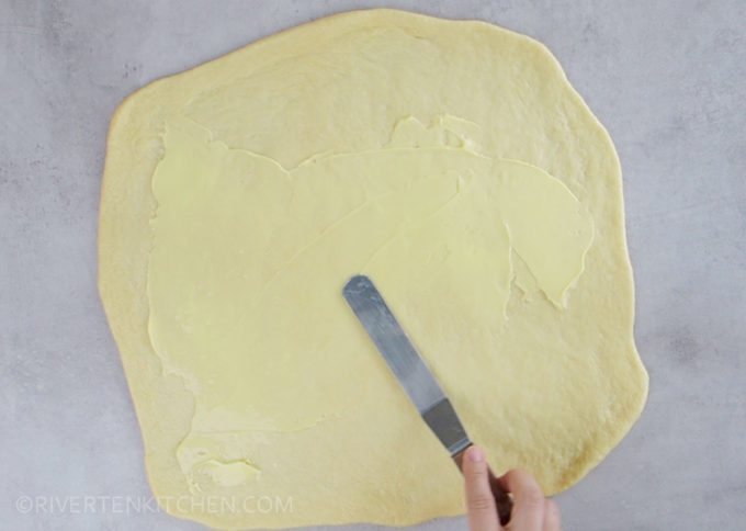 spread butter in dough