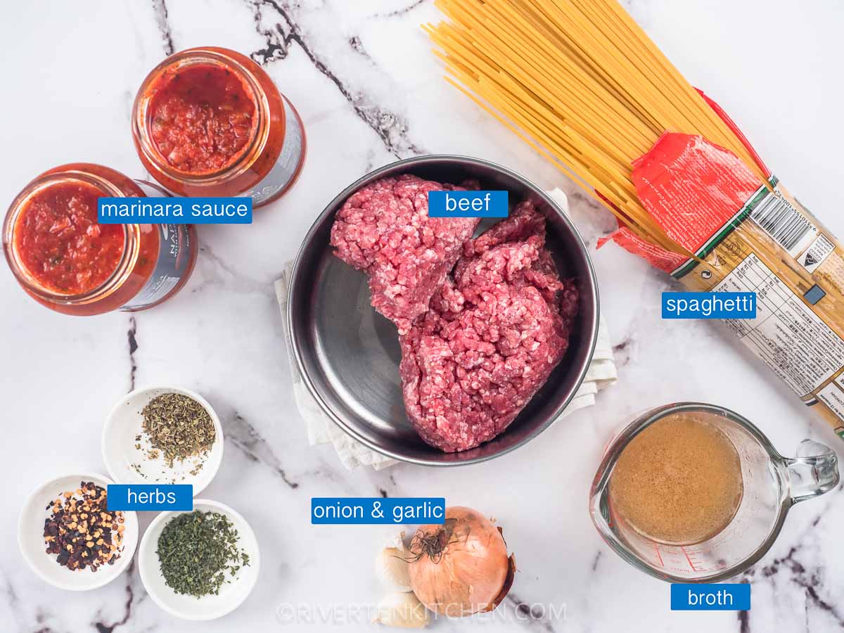 Baked Spaghetti Ingredients-ground beef-marinara sauce-spaghetti-italian seasoning