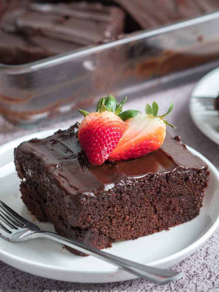 chocolate cake with frosting and strawberries