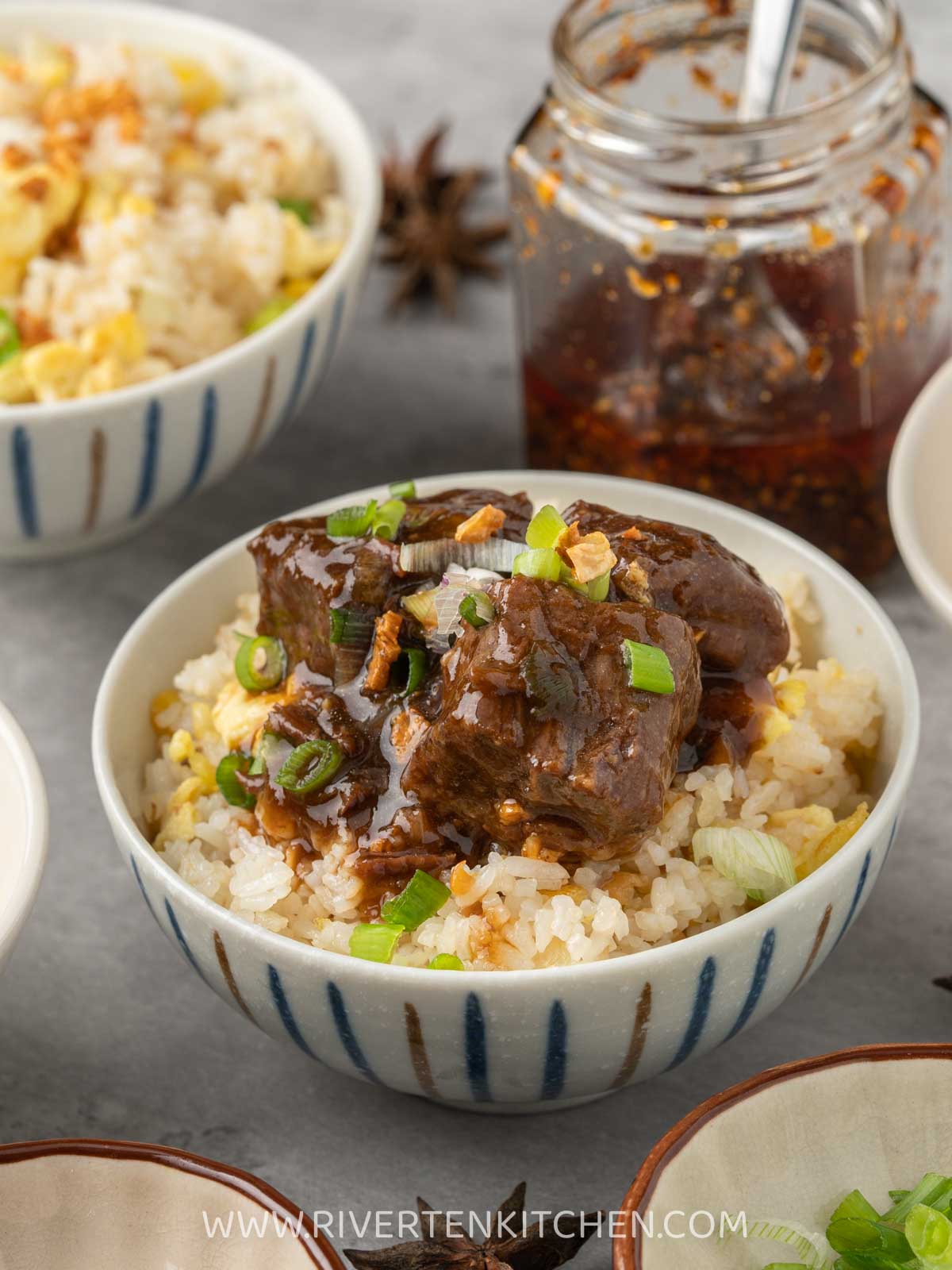 braised beef on top of garlic fried rice