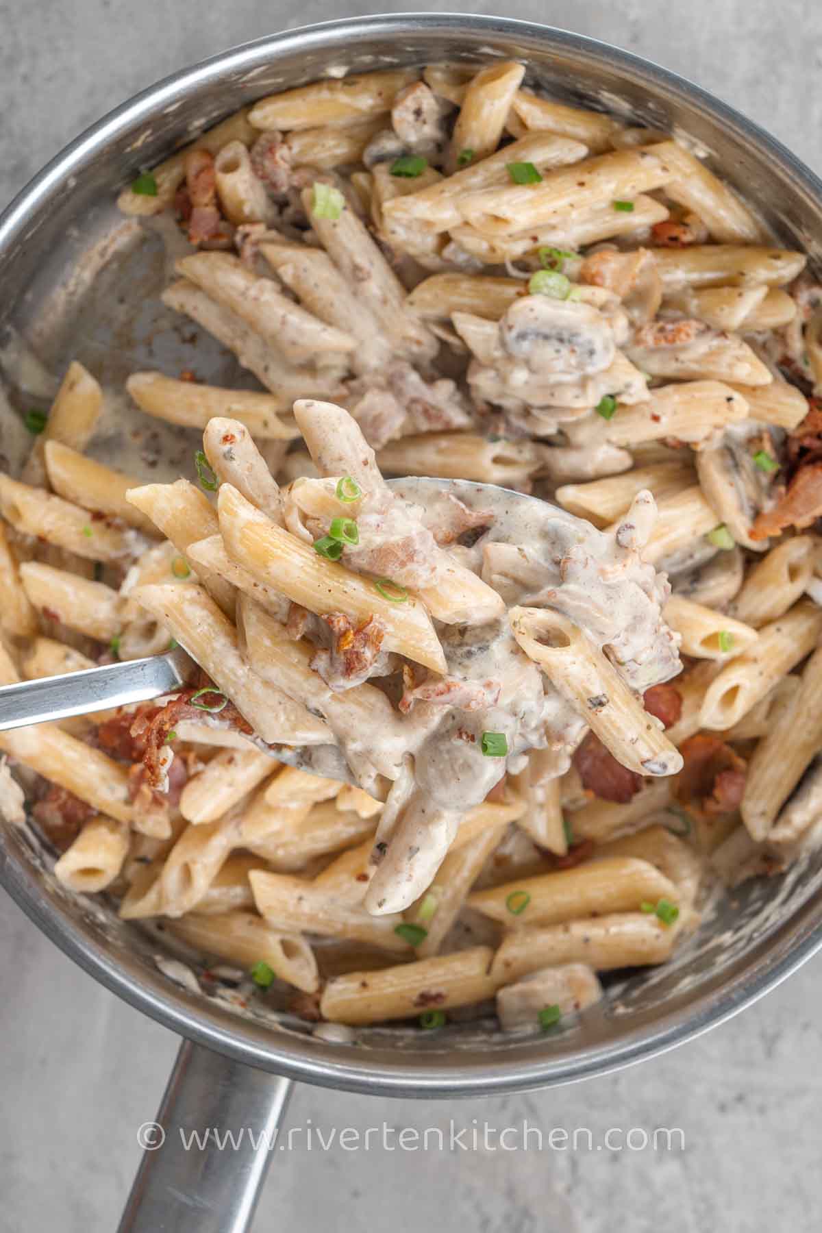 penne pasta with bacon, mushroom, and cream