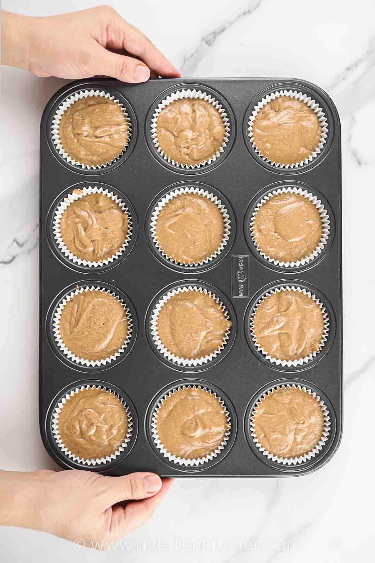 cupcake batter in a muffin pan