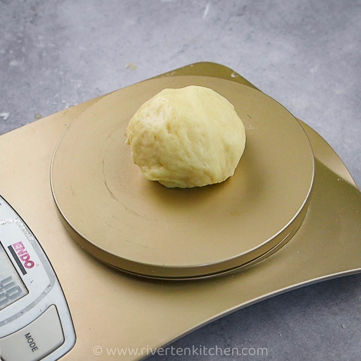 using kitchen scale to weigh dough
