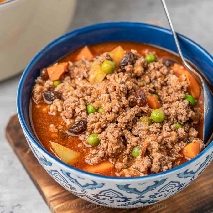 Filipino Picadillo made of ground pork and beef with vegetables.
