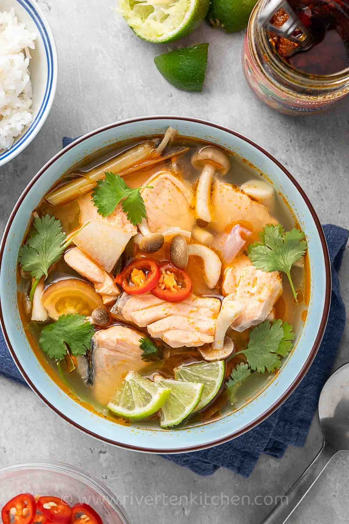 tom yum soup made of salmon fillet and tom yum paste.