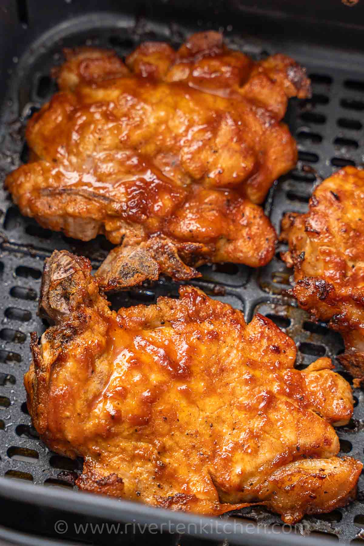tenderized BBQ pork chops cooked in an air-fryer.