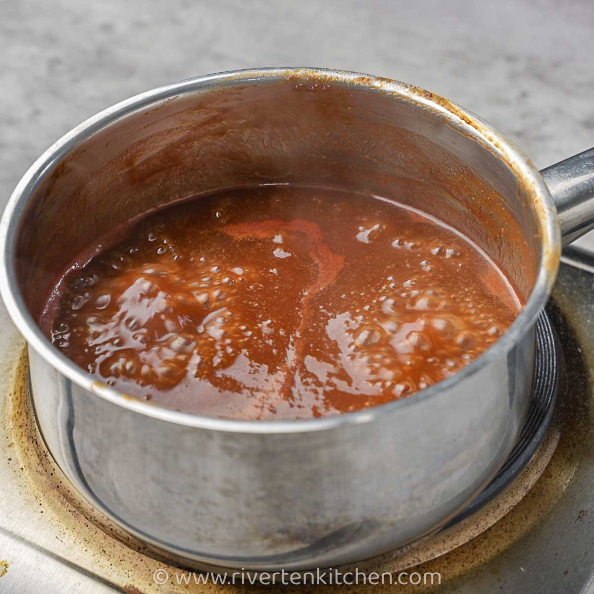 BBQ sauce cooking in a pot.