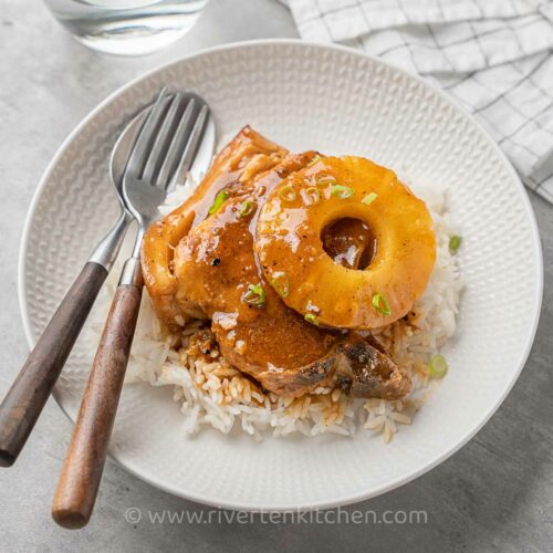 Instant pot Pineapple Hawian pork chops served with white rice.