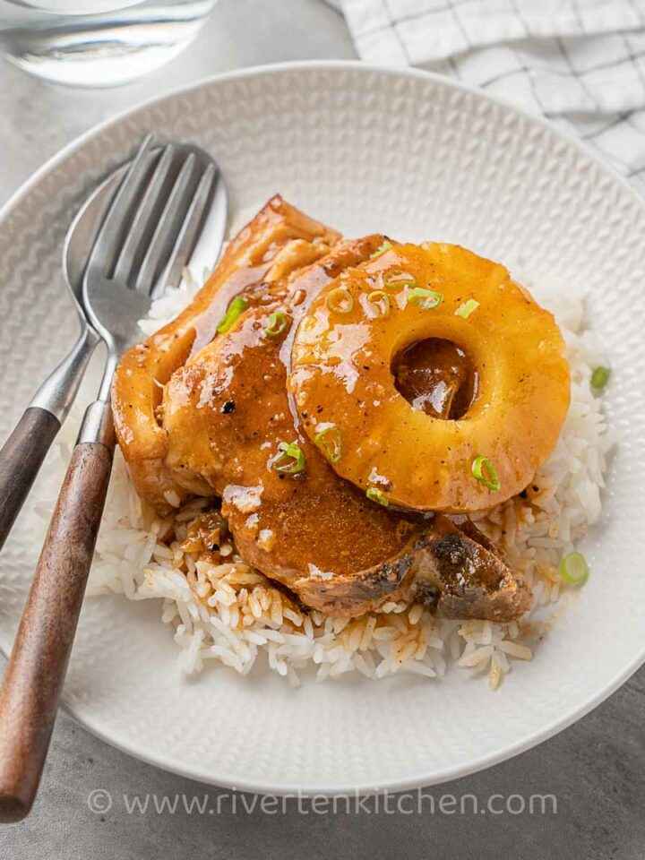 Instant pot Pineapple Hawian pork chops served with white rice.