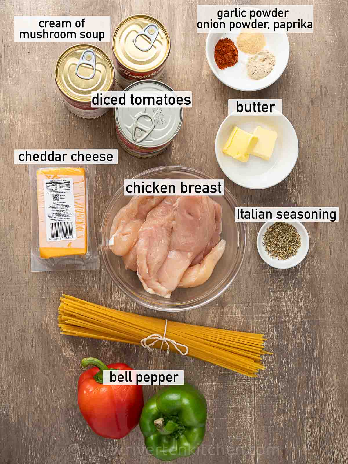 chicken breast, bell peppers, mushroom soup, cheddar cheese, garlic powder, onion powder, Italian seasoning, diced tomatoes, and spaghetti pasta.