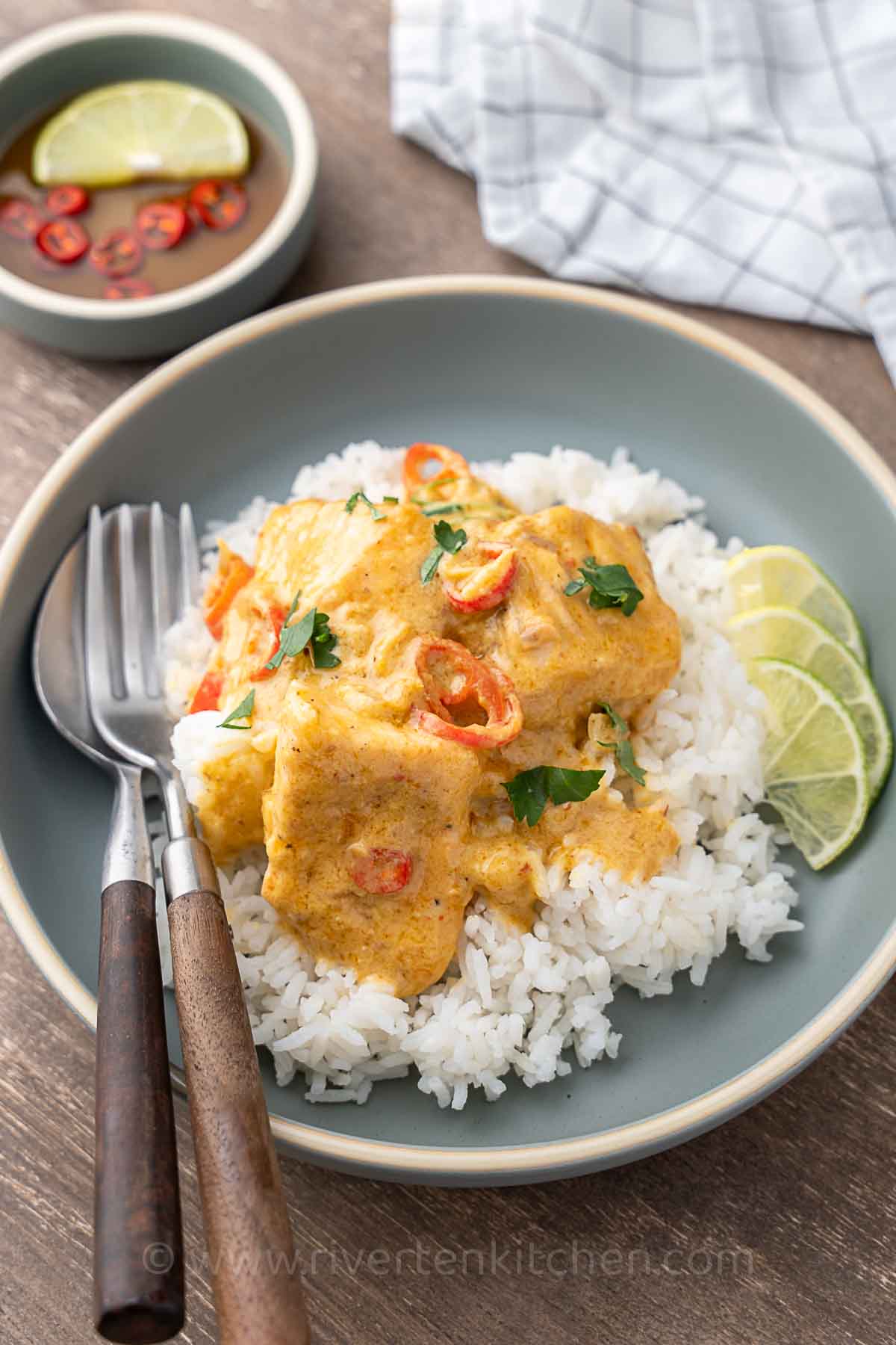 Thai Salmon mango curry on a plate with white rice.