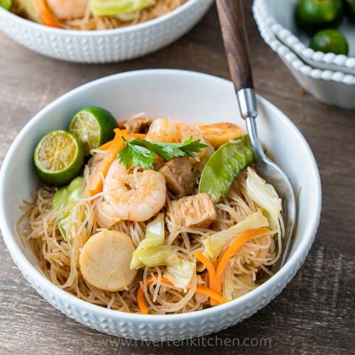 Rice noodles cooked Filipino style - made with pork, shrimp, and vegetables.