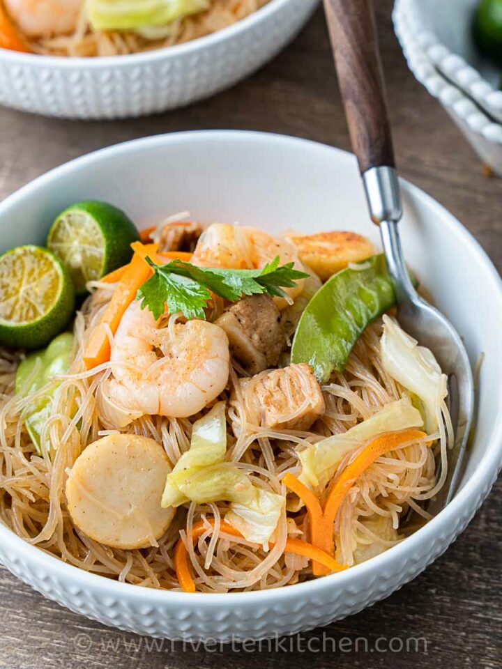 Rice noodles cooked Filipino style - made with pork, shrimp, and vegetables.