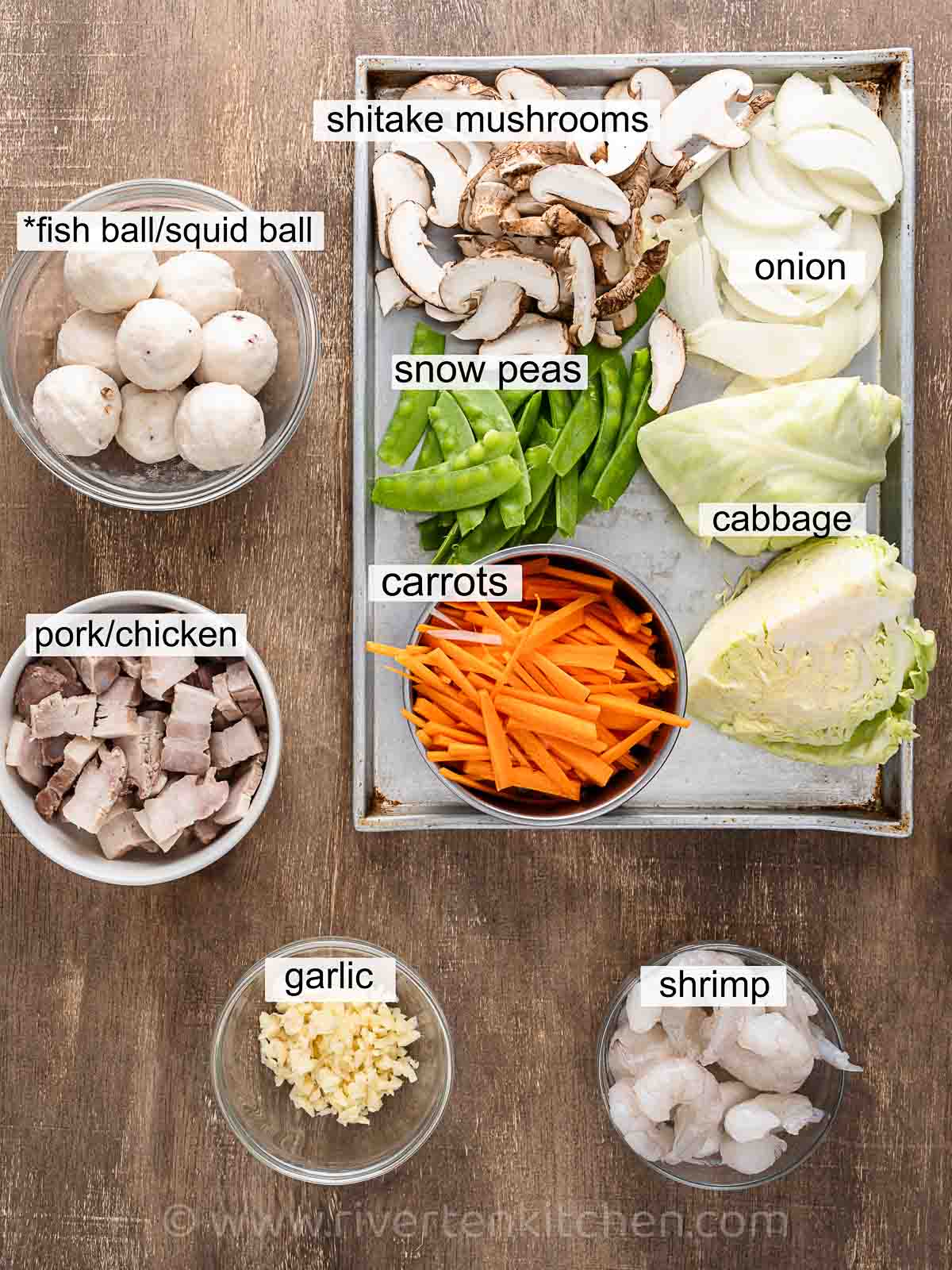 garlic, shrimp, pork, carrots, cabbage, shitake mushrooms, and onion.