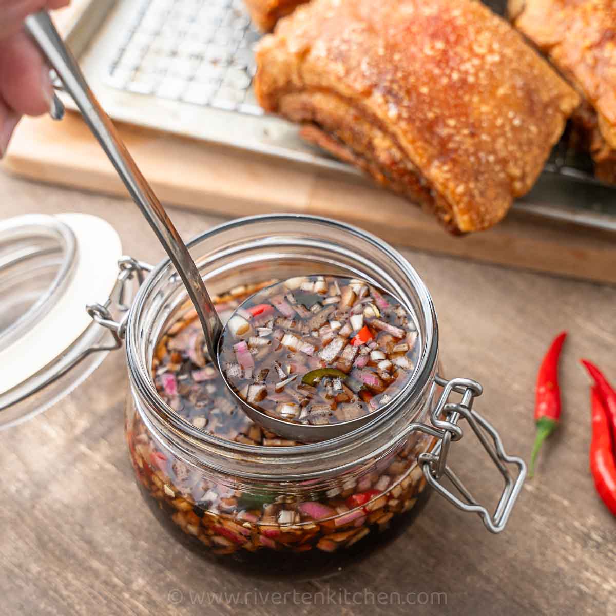 dipping sauce made of soy sauce, vinegar, onion, garlic and chillies.