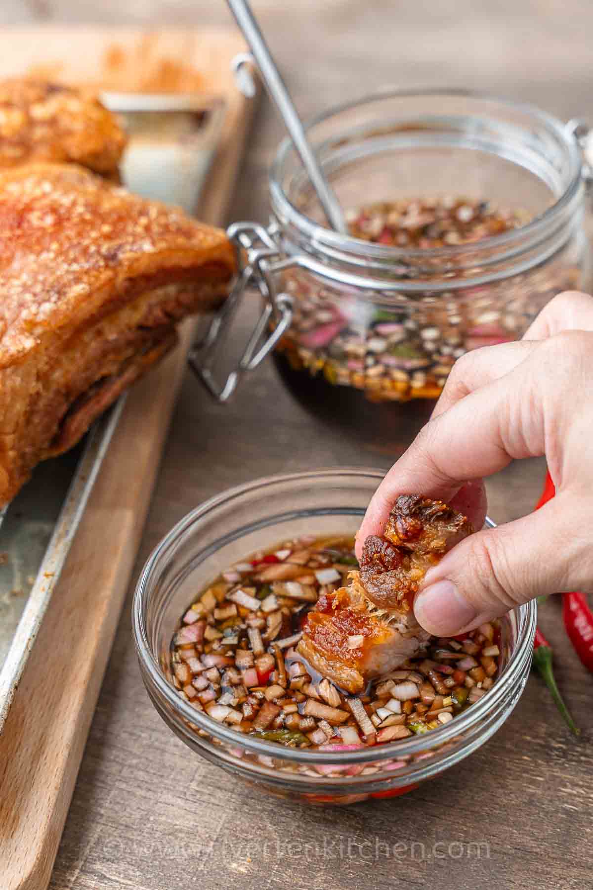 dipping sauce with crispy pork belly.