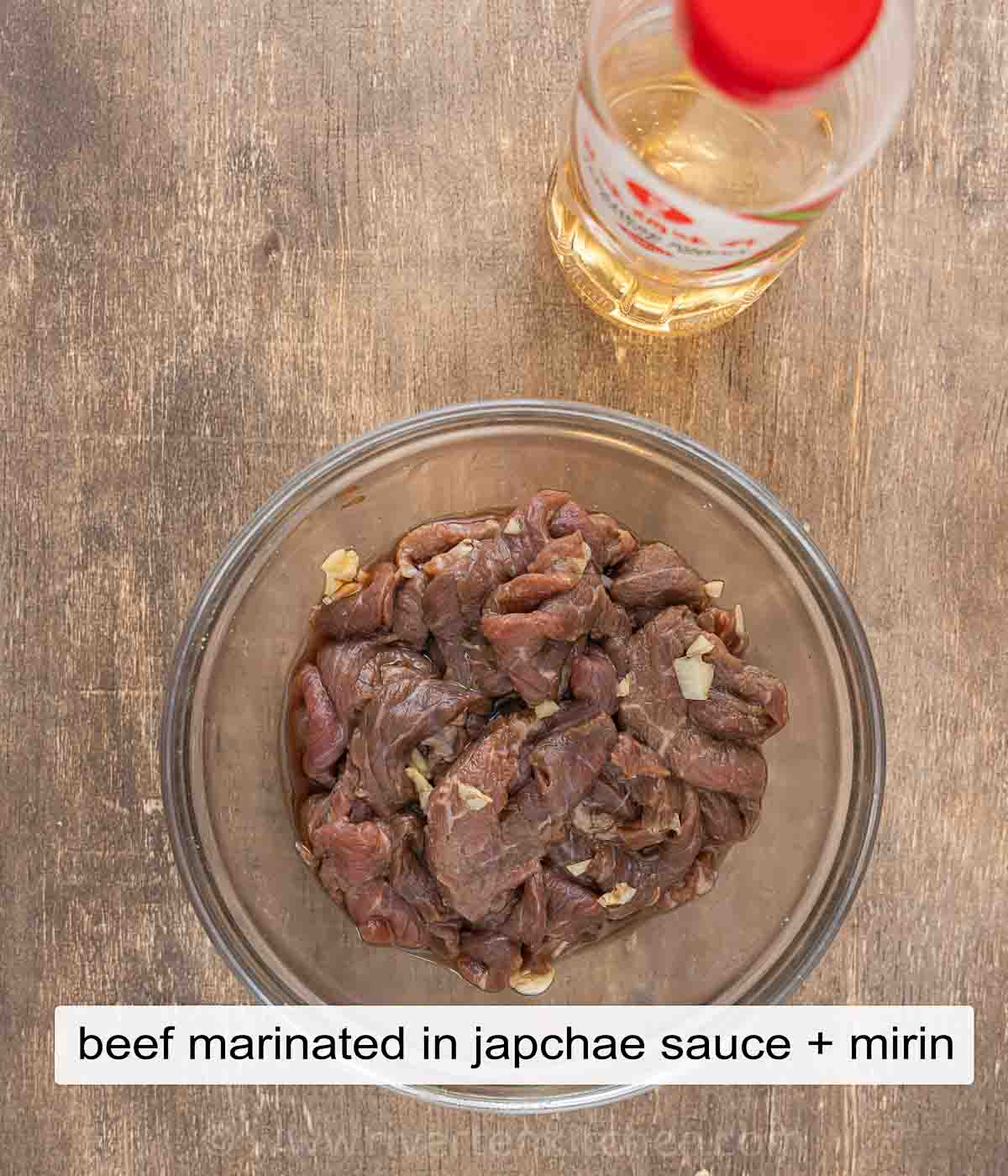beef marinated in japchae sauce and mirin.