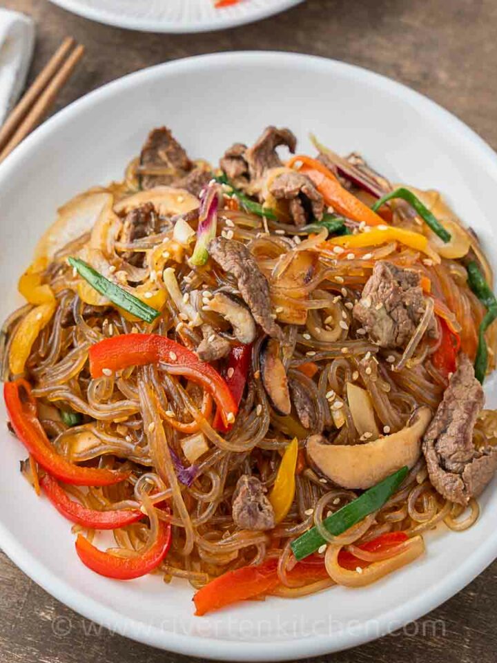 Japchae Korean glass noodles with beef and vegetables.