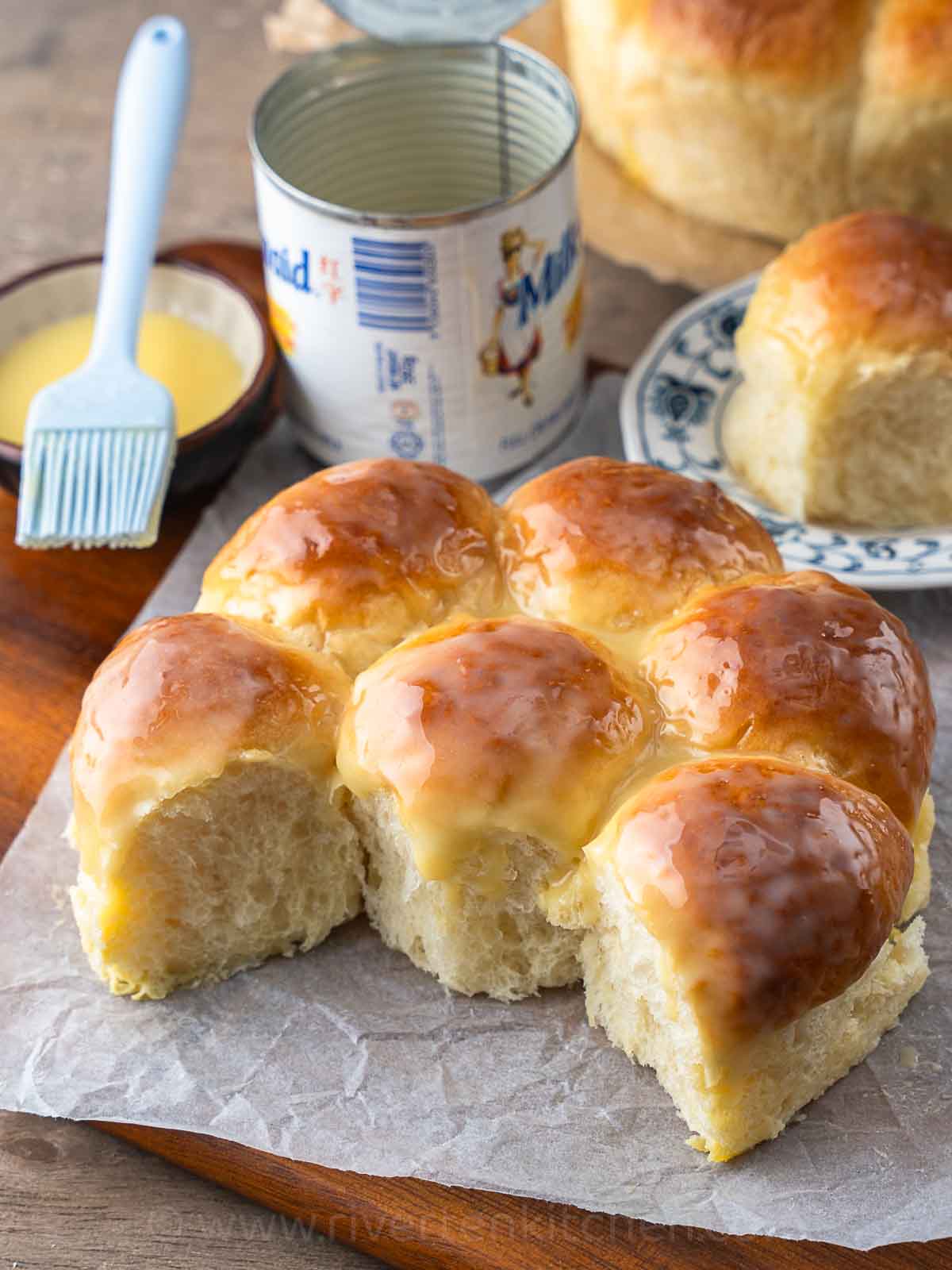 soft milk bread glazed with butter and condensed milk.