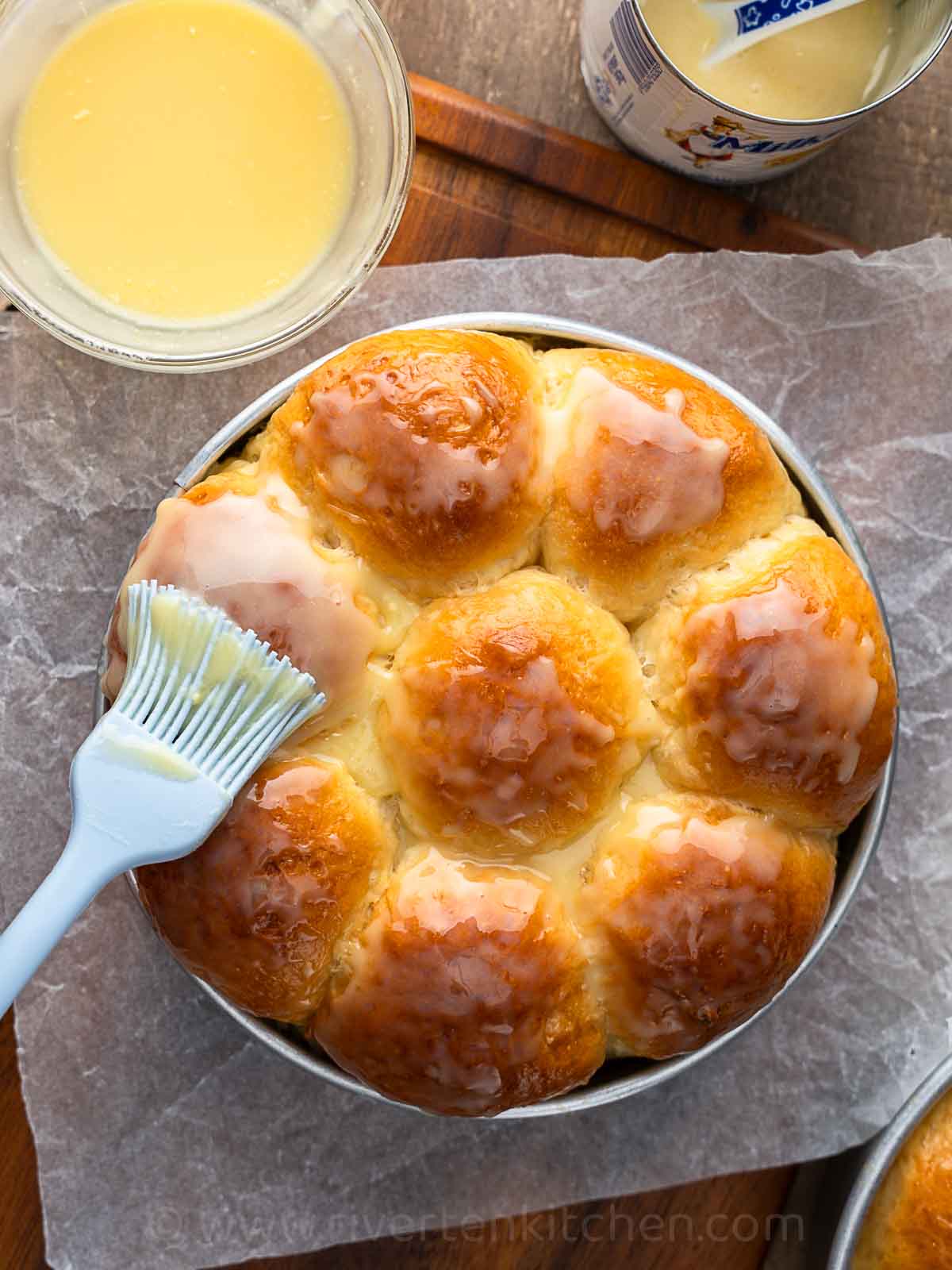 Japanese style soft milk bread glazed with butter and condensed milk.