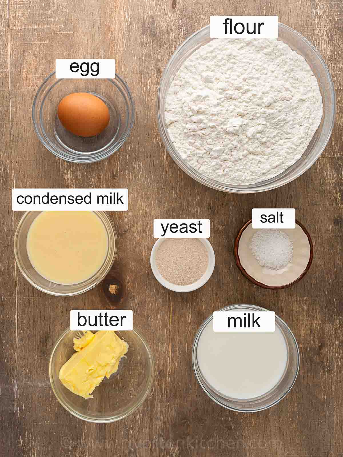 flour, condensed milk, butter, fresh milk, yeast, salt and egg.