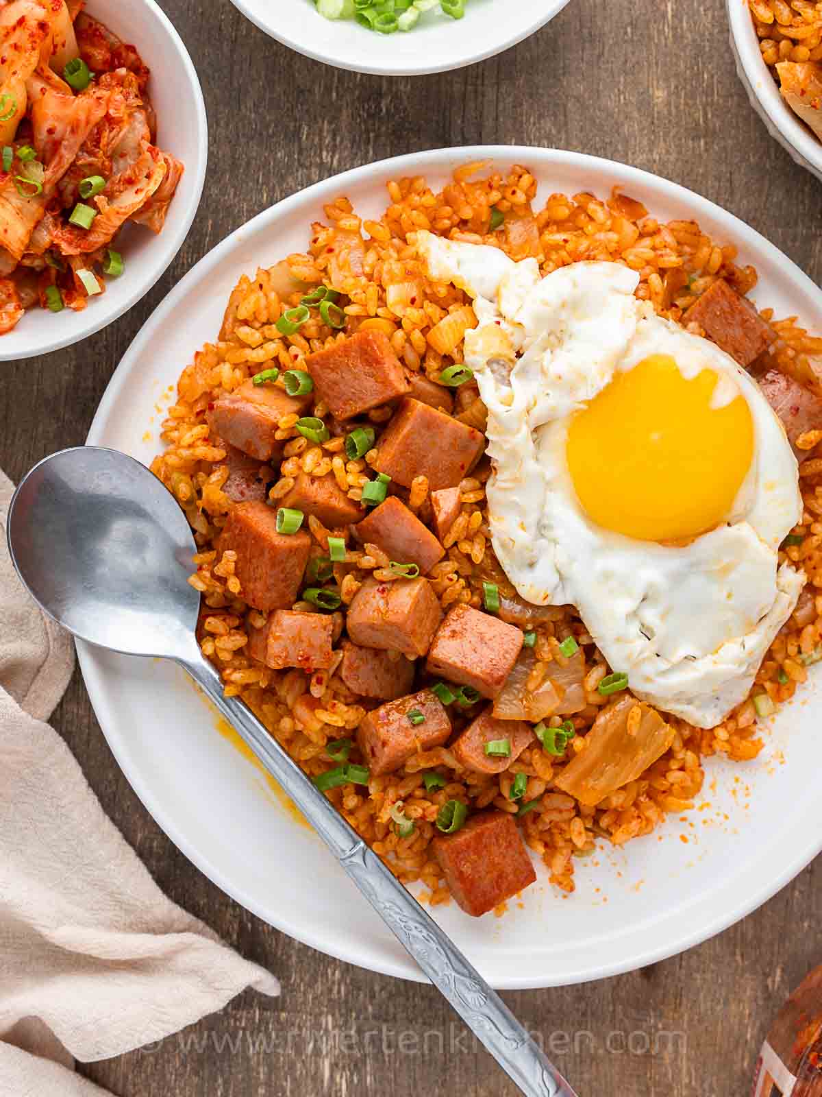 Korean kimchi fried rice with luncheon meat and sunny side eggs.