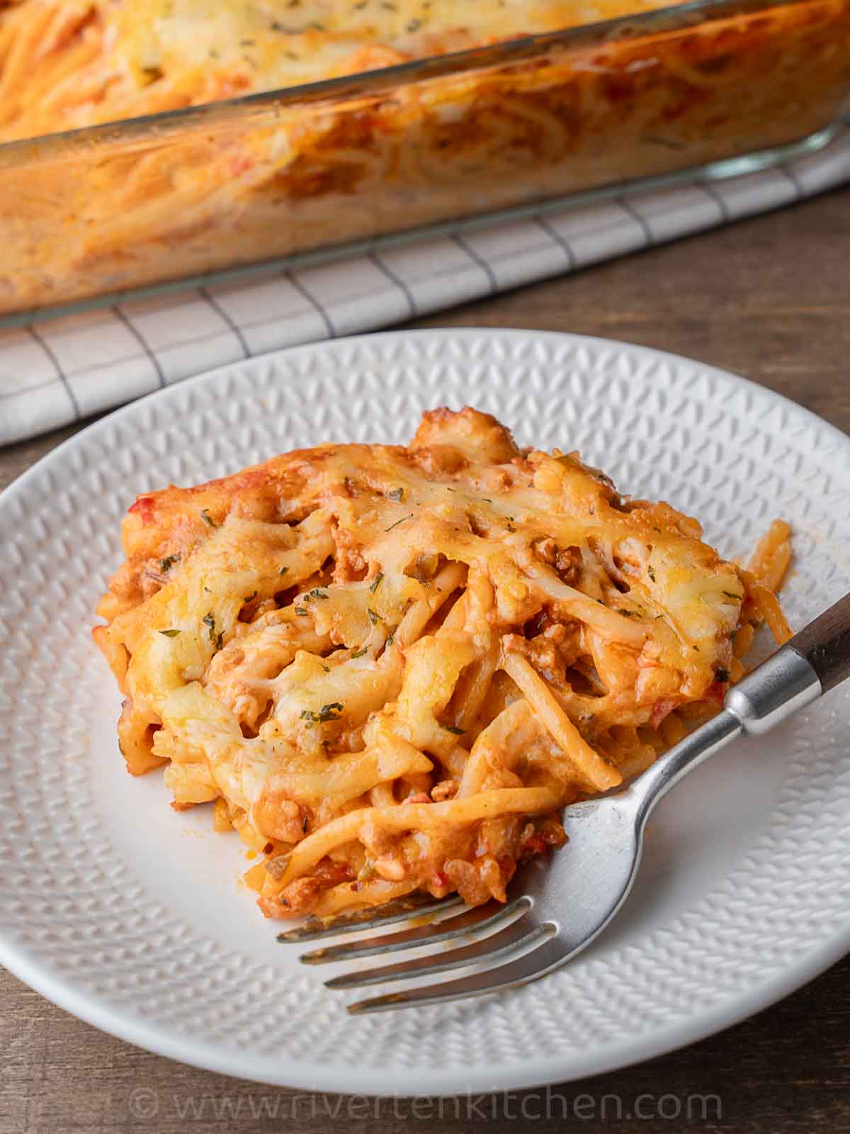 oven baked spaghetti on a plate.