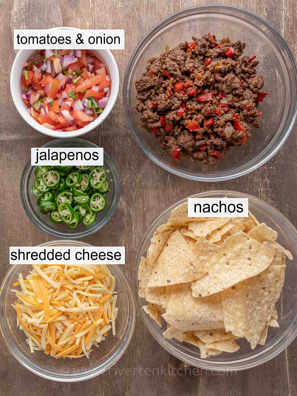 cooked ground beef, shredded cheese, nacho chips, jalapenos, and pico de gallo.