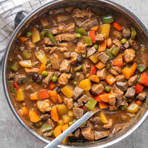 Filipino pork and liver stew with carrots and potatoes.