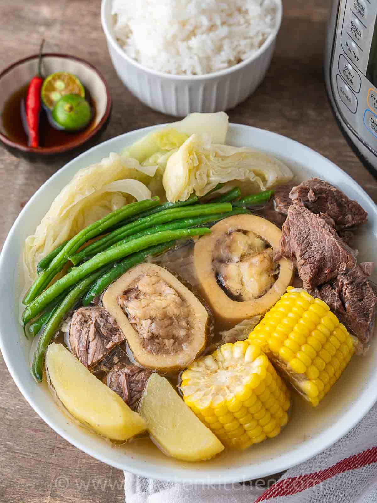 nilagang baka or bulalo recipe with vegetables, and corn on the cub.